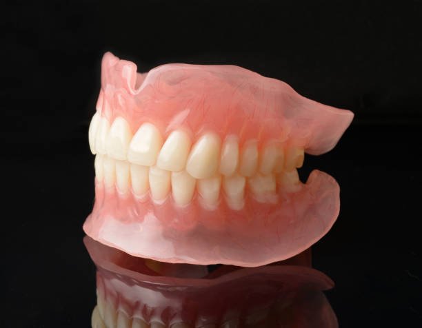 partial dentures removable root canal dentures composite resin inlay onlay bridge crowns Invisalign clear aligners teeth reshaping gummy smile botox bonding teeth whitening miami best dentist straight teeth white teeth perfect teeth beautiful smile veneers smile design veneers